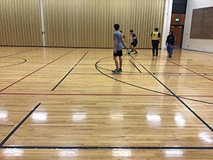 neighbors playing indoor soccer