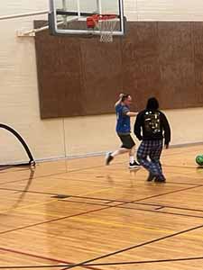 neighbors playing indoor soccer