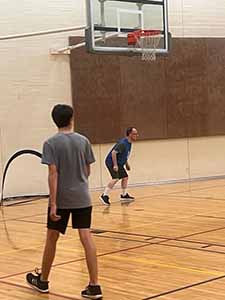 neighbors playing indoor soccer