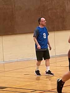 neighbors playing indoor soccer