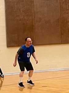 neighbors playing indoor soccer