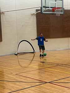 neighbors playing indoor soccer