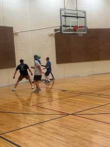 neighbors playing indoor soccer