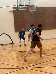 neighbors playing indoor soccer
