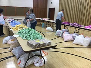 neighbors packing hygiene for homeless women and women in need