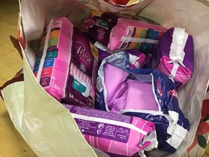 neighbors packing hygiene for homeless women and women in need
