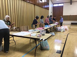 neighbors packing hygiene for homeless women and women in need