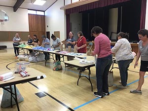 neighbors packing hygiene for homeless women and women in need