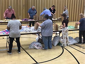 neighbors packing hygiene for homeless women and women in need