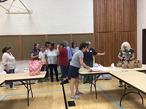 neighbors packing hygiene for homeless women and women in need