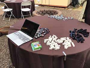 neighbors gather at for Thanksgiving Day potluck dinner
