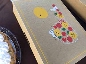 neighbors gather at for Thanksgiving Day potluck dinner