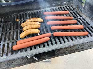 neighbors gather at park for potluck dinner birthday party