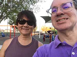 neighbors gather at park for potluck dinner birthday party