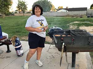 neighbors gather at park for potluck dinner birthday party