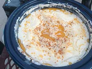 neighbors gather at park for potluck dinner birthday party