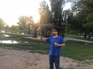 neighbors gather at park for potluck dinner birthday party