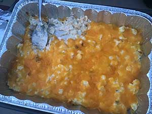 neighbors gather at park for potluck dinner birthday party