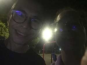 neighbors gather at park for potluck dinner birthday party