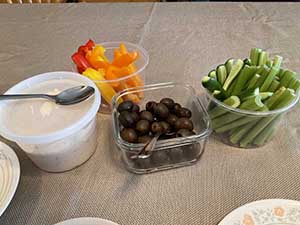 Tempe area neighbors gather at a watch party to watch the movie Hamnet