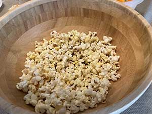 Tempe area neighbors gather at a watch party to watch the movie Hamnet