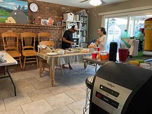Tempe area neighbors gather at a watch party to watch the movie Hamnet