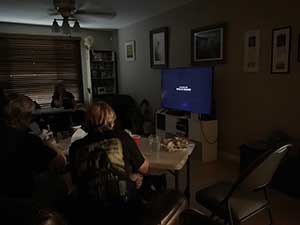 Tempe area neighbors gather at a watch party to watch the movie Hamnet