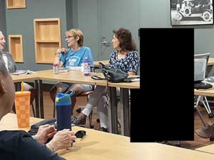 Tempe area neighbors at book club meeting in Tempe Public Library discussing the novel Hamnet