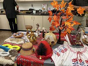 Tempe area neighbors at potluck dinner celebrating Romania