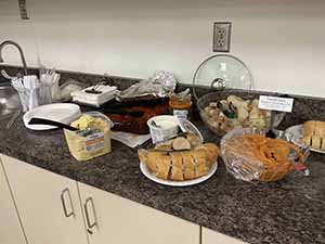 Tempe area neighbors at potluck dinner celebrating Romania