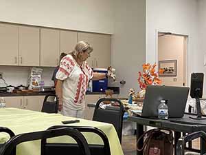 Tempe area neighbors at potluck dinner celebrating Romania
